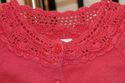 Coral cardigan w/ hand crocheted lace neckline -  