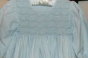 Petit AMI baby blue hand smocked long sleeved dres