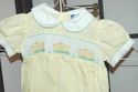 Carriage Boutiques hand smocked yellow ducks on bu