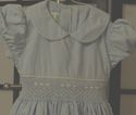 Beautiful light blue hand smocked dress w/puff sle