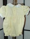 Carriage Boutiques hand smocked yellow ducks on bu