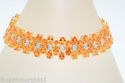 $8,000 34.60CT ORANGE SAPPHIRE & DIAMOND BRACELET 