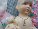 Chalkware Piano Baby Figurine with Teddy Bear