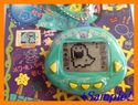 Dinkie Dino Rakuraku Dinokun Tamagotchi Virtual Pe