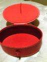 Oval red vinyl box