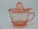 PINK TWO-PIECE MEASURING CUP AND JUICER/REAMER 