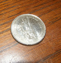 1999 Canadian(November) 25 cent coin. In VERY GOOD