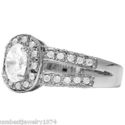 WHITE OVAL CUBIC ZIRCONIA SOLITAIRE SET IN 925 STE