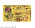 ED HARDY LADY SKULL IN FIRE PINK AND WHITE PLASTIC