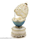 MUSICAL NATURAL GOOSE EGG METAL BASE SWAROVSKI CRY