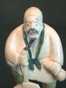 Japanese netsuke - Axeman in kimono has Axe,signed