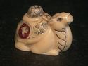 Japanese  netsuke - A Festival Bactrian Camel sits