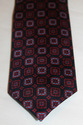 Brioni 7cm Navy Silk Tie With Large Red Medallion 