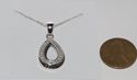 925 Sterling Silver .01 ct Open Teardrop Diamond N