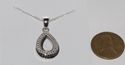 925 Sterling Silver .01 ct Open Teardrop Diamond N