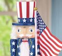 Wooden Patriotic Nutcracker Holding American Flag 