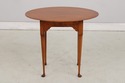 L73740: ELDRED WHEELER Cherry Oval Occasional Tabl