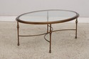 L74705: Oval Glass Top Decorator Coffee Cocktail T