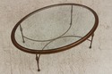 L74705: Oval Glass Top Decorator Coffee Cocktail T