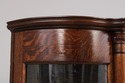 F75057: Antique Oak Curved Glass Display Cabinet