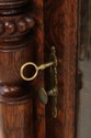 F75057: Antique Oak Curved Glass Display Cabinet