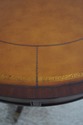 L67976: ETHAN ALLEN Round Mahogany Leather Top Dru