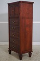 74384: DURHAM Cherry 2 Door 5 Drawer Lingerie Ches