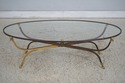 F74539: Iron Brass & Glass Rams Head Coffee Table