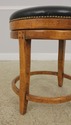 L57010EC: Pair GUY CHADDOCK Round Rustic Stools