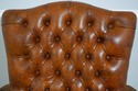 74072: Georgian Tufted Leather Carved Arm Chair