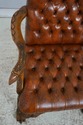 74072: Georgian Tufted Leather Carved Arm Chair