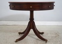 L74162: ETHAN ALLEN Round Leather Top Mahogany Dru