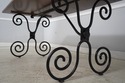 L74399: Scrolled Iron Base Coconut Top Dining Room