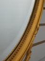 72179: CARVERS GUILD Crowned Oval Gold Gilt Mirror