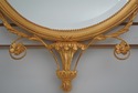 72179: CARVERS GUILD Crowned Oval Gold Gilt Mirror