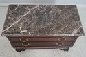 67084: HENKEL HARRIS Marble Top Mahogany Bombe Che