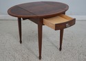 L67068: ETHAN ALLEN Figural Mahogany Pembroke Styl