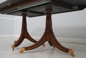 L66493: MAITLAND SMITH Crotch Mahogany Dining Tabl