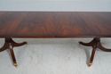 L66493: MAITLAND SMITH Crotch Mahogany Dining Tabl