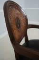  L71550: Vintage French Carved Cane Back Swivel Le