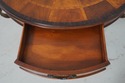 L71378: THEODORE ALEXANDER Round Iron And Burl Wal