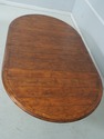 L73898: GUY CHADDOK Round Distressed Dining Room T