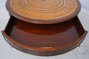 L74058: MAITLAND SMITH Round Mahogany Leather Top 