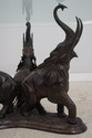 L73945: Bronze Elephant Base Glass Top Dining Room