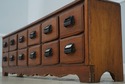 F74251: Antique 12 Drawer Oak Apothecary Cabinet