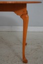 L74257: Tiger Maple Benchmade Round Dining Table