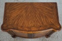 L73624: SCHNADIG Stately Wood & Rattan Bedside Tab