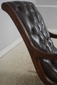 L73334: Brown Tufted Leather Rocking Chair