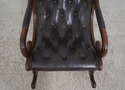 L73334: Brown Tufted Leather Rocking Chair