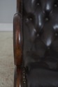 L73334: Brown Tufted Leather Rocking Chair